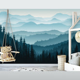 Ombre Blue Mountain Pine Forest Trees Mural/Wallpaper from Coloritto, featuring a serene forest design with a soothing ombre blue effect. Perfect for enhancing any room's atmosphere. Available at Coloritto
